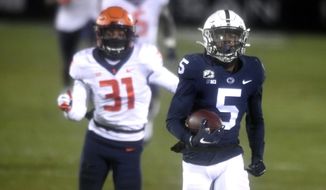 Penn State wide receiver Jahan Dotson (5) scores a touchdown on a 75-yard pass in the first quarter of an NCAA college football game in State College, Pa., on Saturday, Dec. 19, 2020. (AP Photo/Barry Reeger)