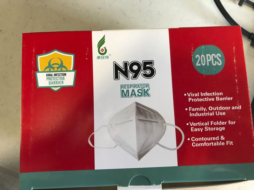 This May 26, 2020, photo by the Texas Division of Emergency Management shows a box of respirator masks. The competitive scramble by states to buy personal protective equipment this spring stuck some businesses with big bills. An Associated Press analysis of state purchasing data during the beginning of the coronavirus pandemic found that states canceled billions of dollars in PPE orders. Many of the cancellations occurred when businesses couldn't get the products to states under tight deadlines or when prices rose. (Texas Division of Emergency Management via AP)