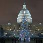 U.S. Capitol Christmas Tree is seen at the U.S. Capitol at night after negotiators sealed a deal for COVID relief Sunday, Dec. 20, 2020, in Washington. Top Capitol Hill negotiators sealed a deal Sunday on an almost $1 trillion COVID-19 economic relief package, finally delivering long-overdue help to businesses and individuals and providing money to deliver vaccines to a nation eager for them. (AP Photo/Jose Luis Magana.