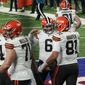 Cleveland Browns quarterback Baker Mayfield (6) celebrates with teammate Austin Hooper (81) after they connect for a touchdown during the first half of an NFL football game against the New York Giants, Sunday, Dec. 20, 2020, in East Rutherford, N.J. (AP Photo/Seth Wenig)