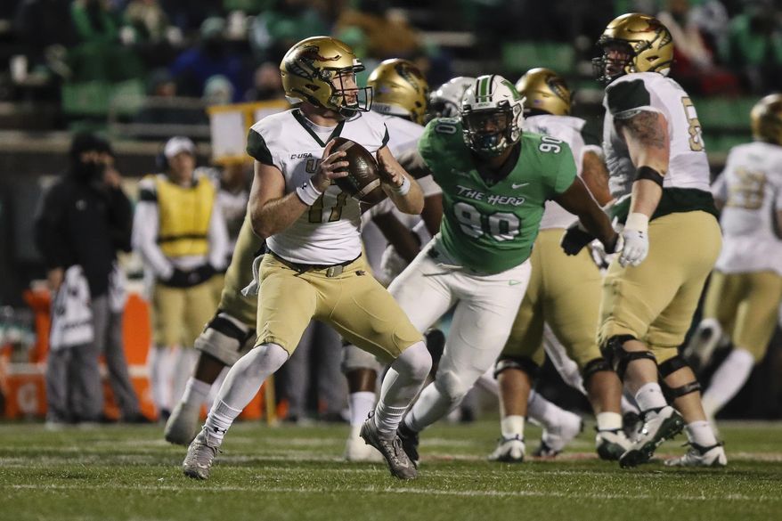 UAB quarterback Tyler Johnston (17) looks to make a pass as the Blazers take on Marshall during an NCAA college football game for the Conference USA Football Championship on Friday, Dec. 18, 2020, in Huntington, W.Va. (Sholten Singer/The Herald-Dispatch via AP)