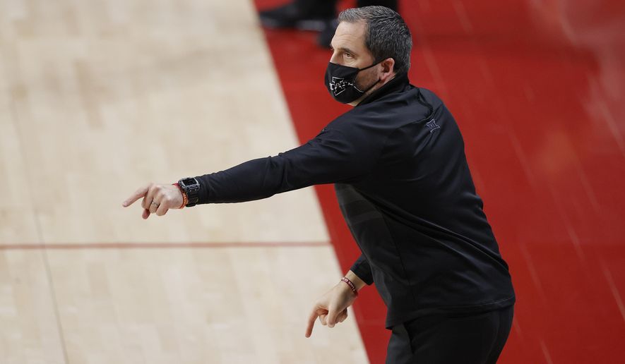 Iowa State head coach Steve Prohm directs his team against Jackson State during the first half of an NCAA college basketball game, Sunday, Dec. 20, 2020, in Ames, Iowa. (AP Photo/Matthew Putney)