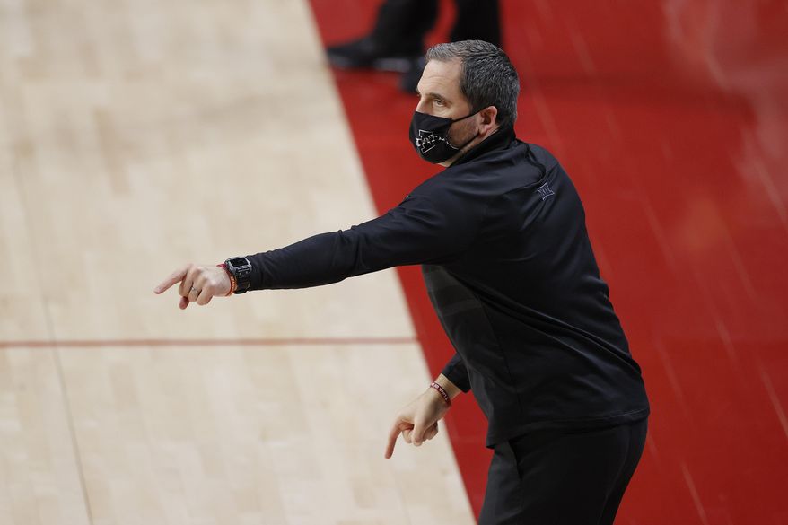 Iowa State head coach Steve Prohm directs his team against Jackson State during the first half of an NCAA college basketball game, Sunday, Dec. 20, 2020, in Ames, Iowa. (AP Photo/Matthew Putney)
