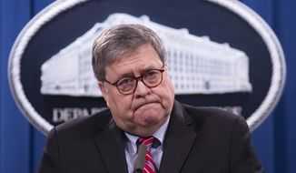 Attorney General William Barr speaks during a news conference, Monday, Dec. 21, 2020, at the Justice Department in Washington. (Michael Reynolds/Pool via AP) **FILE**