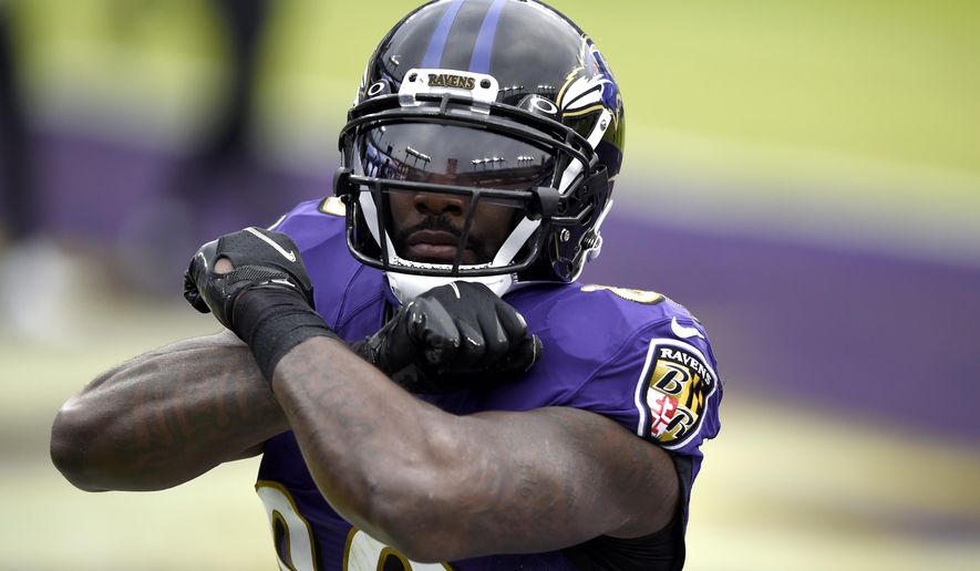 Baltimore Ravens wide receiver Dez Bryant reacts after catching a touchdown pass against the Jacksonville Jaguars during the first half of an NFL football game, Sunday, Dec. 20, 2020, in Baltimore. (AP Photo/Gail Burton)