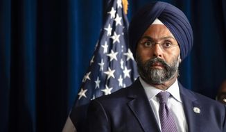FILE- In this Aug. 5, 2019 file photo, New Jersey Attorney General Gurbir Grewal is shown during a bill signing ceremony at the state capital in Trenton, N.J. The release of New Jersey state troopers&#39; disciplinary reports going back to 2000 won&#39;t go forward on Wednesday, July 15, 2020, as the attorney general planned because of a court order blocking their release. (AP Photo/Matt Rourke, File)
