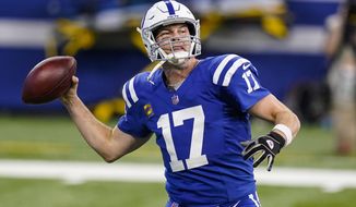 Indianapolis Colts quarterback Philip Rivers (17) throws against the Houston Texans in the first half of an NFL football game in Indianapolis, Sunday, Dec. 20, 2020. (AP Photo/Darron Cummings)
