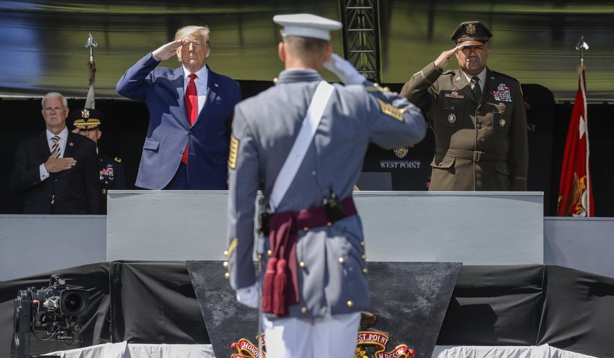 FILE - In this June 13, 2020 photo, President Donald Trump, left, and the United States Military Academy superintendent Darryl A. Williams, right, salute graduating cadets as the national anthem is played during commencement ceremonies in West Point, N.Y. More than 70 West Point cadets have been accused of cheating on a math exam taken online when they were studying remotely because of the coronavirus pandemic. A spokesman at the U.S. Military Academy says 55 cadets admitted cheating on the calculus exam in May. (AP Photo/John Minchillo, Pool)