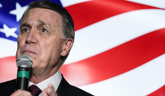 In this Friday, Nov. 13, 2020, photo, candidate for U.S. Senate Sen. David Perdue speaks during a campaign rally, in Cumming, Ga. Perdue is hoping years spent as one of Donald Trump&#39;s biggest defenders pays off in Georgia, a state the president lost in last month&#39;s election. Perdue and Georgia&#39;s other senator, Republican Kelly Loeffler, are both campaigning for Jan. 5 runoff elections that will decide control of the Senate. (AP Photo/Brynn Anderson) **FILE**