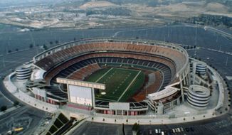 FILE - This 1987 file photo shows an aerial view of Jack Murphy Stadium in San Diego, Calif., site of Super Bowl XXII. Now the stadium is coming to an unceremonious end, leaving generations of fans feeling melancholy because, due to the coronavirus pandemic, they didn&#39;t get to say a proper goodbye to the place where they tailgated with gusto in the massive parking lot before cheering on the Chargers, Padres and Aztecs, or watched myriad other events and concerts. (AP Photo/File)