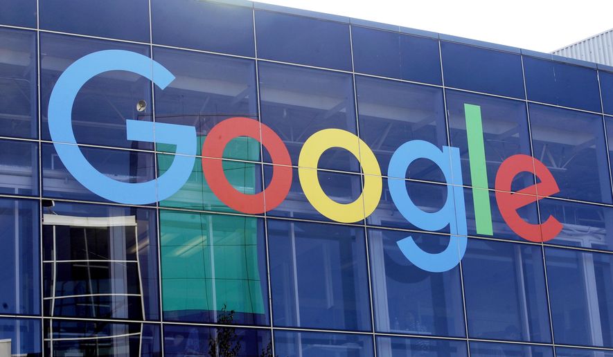 In this Sept. 24, 2019, file photo a sign is shown on a Google building at their campus in Mountain View, Calif. (AP Photo/Jeff Chiu, File)  **FILE**