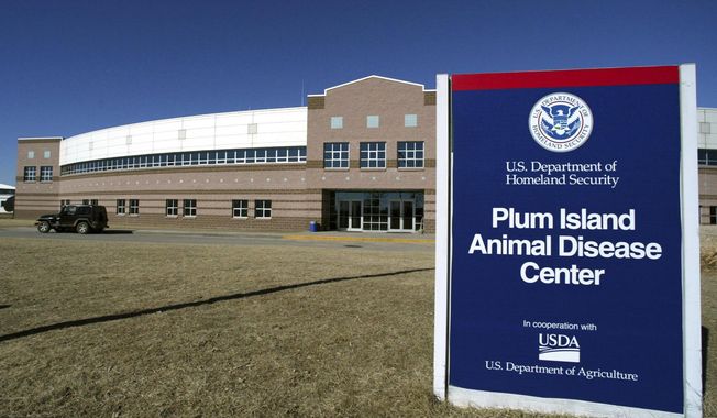 The Plum Island Animal Disease Center on Plum Island, N.Y. is shown, Feb. 16, 2004. Congress has repealed a mandate that would have required the government sell the island in Long Island Sound that for years has housed a government animal disease research facility. The move is a victory for conservationists, who have fought to prevent development on Plum Island, home to rare birds, sea turtles and other animals. (AP Photo/Ed Betz, File)