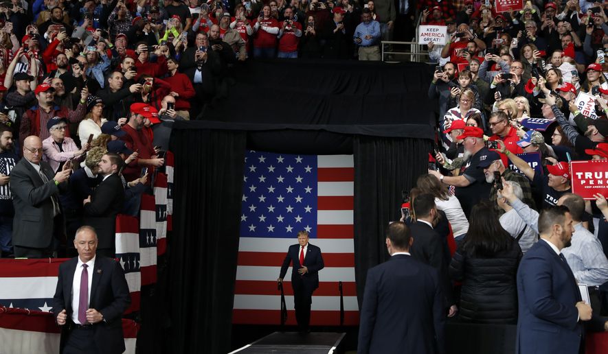 President Donald Trump arrives at a campaign rally in Toledo, Ohio, on Jan. 9, 2020. (AP Photo/Jacquelyn Martin)
