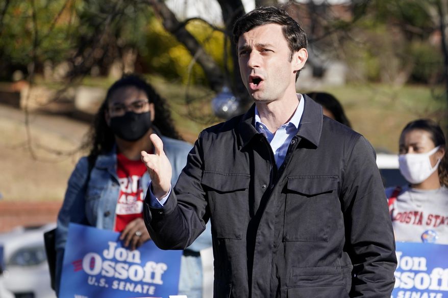 Democratic nominee for U.S. Senate from Georgia Jon Ossoff speaks after voting early in Atlanta on Tuesday, Dec. 22, 2020. For the second time in three years, Jon Ossoff is campaigning in overtime. The question is whether the 33-year-old Democrat can deliver a win in a crucial Jan. 5 runoff with Republican Sen. David Perdue. (AP Photo/John Bazemore)