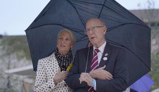 FILE - In this Sept. 17, 2020 file photo, Sen. Pat Roberts, R-Kan., and his wife Franki Roberts attend the dedication ceremony for the monument dedicated to Dwight D. Eisenhower, in Washington. Sen. Pat Roberts, delivered his farewell speech on the Senate floor Dec. 10, 2020 after 40 years in Congress. Roberts, is winding down a Washington career that spans ten presidencies, beginning in 1967 as an aide to two Kansas Republicans, Sen. Frank Carlson and later Rep. Keith Sebelius. (AP Photo/Susan Walsh File)