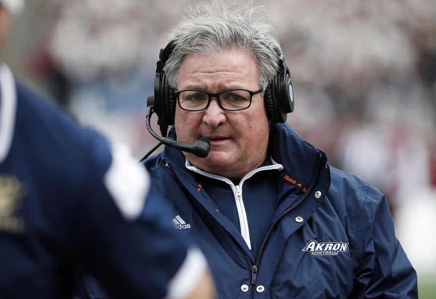 FILE - In this Nov. 7, 2015, file photo, Akron head coach Terry Bowden watches during the first quarter of an NCAA college football game against Massachusetts in Foxborough, Mass. Bowden has been hired by Louisiana-Monroe to rebuild a program that went 0-10 this season. Bowden, the son of former Florida State coaching great Bobby Bowden, has been serving as a graduate assistant at Clemson the last two years. (AP Photo/Michael Dwyer, File)