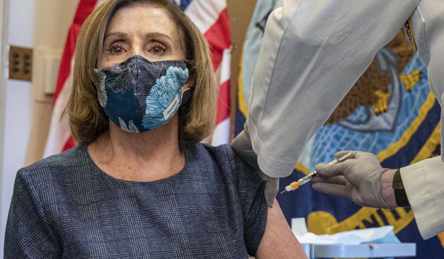 FILE - In this Friday, Dec. 18, 2020, file photo, Speaker of the House Nancy Pelosi, D-Calif., receives a Pfizer-BioNTech COVID-19 vaccine shot from Dr. Brian Monahan, the Capitol physician, in Washington. On Thursday, Dec. 24, 2020, The Associated Press reported on stories circulating online incorrectly asserting that the doctor never removed a cap from the syringe, so she never actually received the shot. Photos and news reports clearly document every step of the process of her successfully receiving the injection. (Ken Cedeno/Pool via AP)