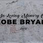 File-This Jan. 28, 2020, file photo shows a remembrance board at a memorial for Kobe Bryant near Staples Center in Los Angeles. Bryant, the 18-time NBA All-Star who won five championships and became one of the greatest basketball players of his generation during a 20-year career with the Los Angeles Lakers, died in a helicopter crash Sunday. (AP Photo/Ringo H.W. Chiu, File)