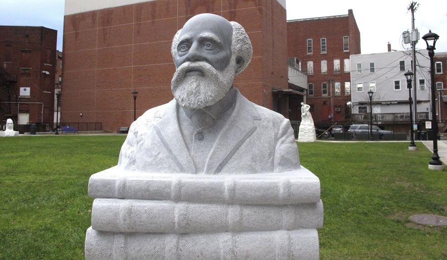 A sculpture of Henry Martin Freeman, the first Black American College president, is on display in his home city of Rutland, Vt., on Monday, Nov. 23, 2020. Freeman graduated from Middlebury College in 1849, and became president of Allegheny Institute in 1856, which later became Avery College, in Pittsburgh, Pa. (AP Photo/Lisa Rathke)