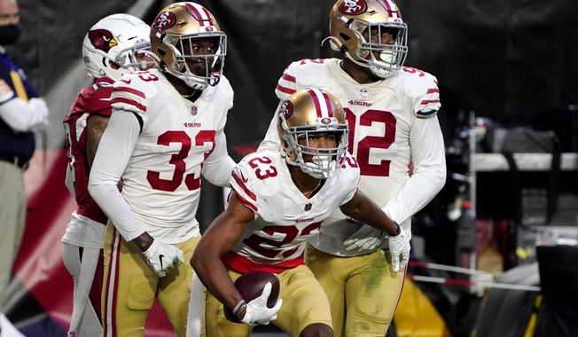 San Francisco 49ers cornerback Ahkello Witherspoon (23) celebrates his interception against the Arizona Cardinals during the second half of an NFL football game, Saturday, Dec. 26, 2020, in Glendale, Ariz. (AP Photo/Rick Scuteri)