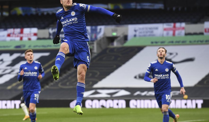 Leicester&#x27;s Jamie Vardy celebrates after scoring the opening goal of the game from the penalty spot during the English Premier League soccer match between Tottenham Hotspur and Leicester City at the White Hart Lane stadium in London, Sunday, Dec., 20 2020. (Andy Rain/ Pool via AP)