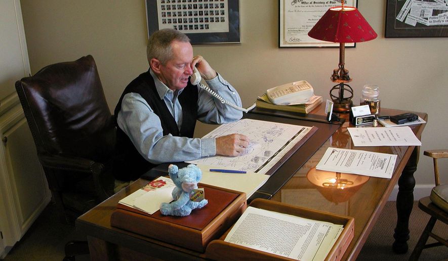 File-In this Nov. 5, 2002 file photo, Rep. Vic Stelly, R-Moss Bluff, speaks in his office in Moss Bluff, La., to a constituent. Victor “Vic” Stelly, a former Louisiana lawmaker who served 16 years in the state House and later as a member of Louisiana’s higher education policy board, has died. He was 79. Louisiana Gov. John Bel Edwards confirmed Stelly's death in a tweet Saturday, Dec. 26, 2020. He did not say how or when Stelly died.(Sonny Marks/American Press via AP)