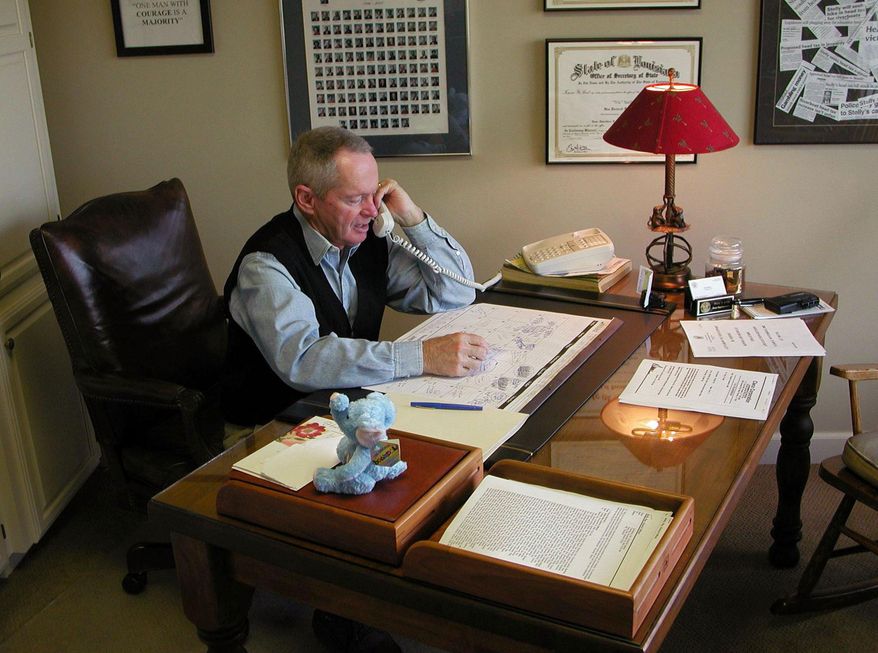 File-In this Nov. 5, 2002 file photo, Rep. Vic Stelly, R-Moss Bluff, speaks in his office in Moss Bluff, La., to a constituent. Victor “Vic” Stelly, a former Louisiana lawmaker who served 16 years in the state House and later as a member of Louisiana’s higher education policy board, has died. He was 79. Louisiana Gov. John Bel Edwards confirmed Stelly's death in a tweet Saturday, Dec. 26, 2020. He did not say how or when Stelly died.(Sonny Marks/American Press via AP)