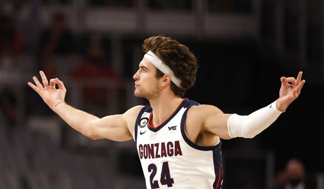 Gonzaga forward Corey Kispert (24) reacts after making a 3-point basket against Virginia during the first half of an NCAA college basketball game, Saturday, Dec. 26, 2020, in Fort Worth, Texas. (AP Photo/Ron Jenkins) **FILE**