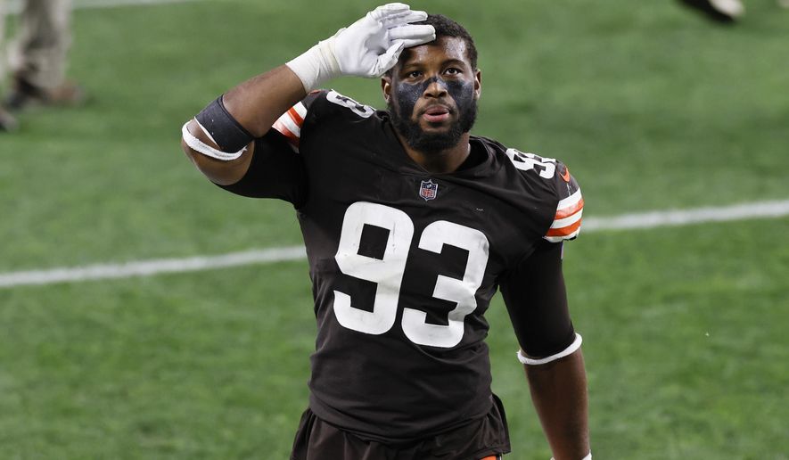 FILE - In this Oct. 11, 2020, file photo, Cleveland Browns middle linebacker B.J. Goodson (93) celebrates after the Browns defeated the Indianapolis Colts 32-23 during an NFL football game, in Cleveland. The Browns won't have starting linebacker B.J. Goodson for the game on Sunday, Dec. 27, against the New York Jets and maybe not in the season finale after he tested positive for COVID-19. (AP Photo/Ron Schwane, File)