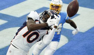 Denver Broncos wide receiver Jerry Jeudy (10) misses a pass in the end zone during the second half of an NFL football game against the Los Angeles Chargers Sunday, Dec. 27, 2020, in Inglewood, Calif. (AP Photo/Ashley Landis)
