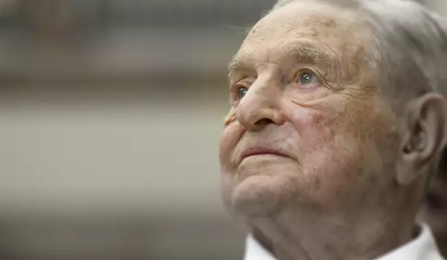 George Soros, founder and chairman of the Open Society Foundations, looks before the Joseph A. Schumpeter award ceremony in Vienna, Austria. (AP Photo/Ronald Zak, File) Photo edited for Best of 2020 list.  