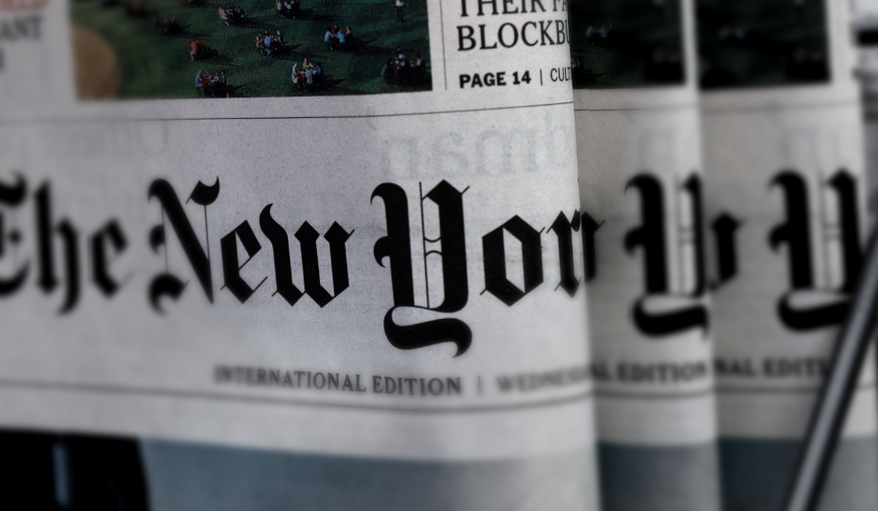 This July 15, 2020, file photo shows copies of The New York Times newspaper displayed for sale at a newsstand in Hong Kong. (AP Photo/Kin Cheung, File) Photo edited for Best of 2020 list.