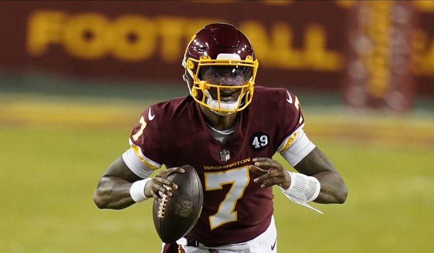 Washington Football Team quarterback Dwayne Haskins (7) runs with the ball during the first half of an NFL football game against the Carolina Panthers, Sunday, Dec. 27, 2020, in Landover, Md. (AP Photo/Carolyn Kaster) **FILE**