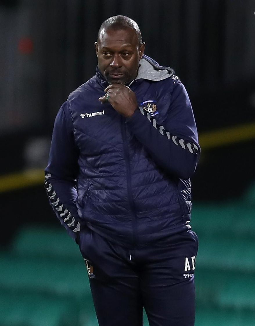 FILE - Dec. 13, 2020 file photo of Kilmarnock soccer manager Alex Dyer. The Kilmarnock soccer team in Scotland’s top league says its manager has been the target of a racially abusive letter. Kilmarnock says it “utterly condemns” the letter containing abuse directed at Alex Dyer who became the league’s only Black manager when he was appointed this summer. (Jane Barlow/PA via AP)