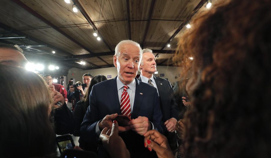 In this Tuesday, Feb. 11, 2020, file photo, Democratic presidential candidate, former Vice President Joe Biden, greets supporters after speaking at a campaign event in Columbia, S.C. (AP Photo/Gerald Herbert) ** FILE **