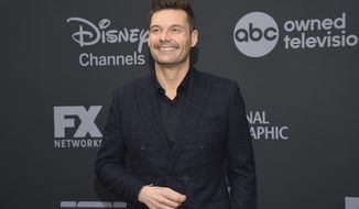 FILE - In this May 14, 2019 file photo, Ryan Seacrest attends the Walt Disney Television 2019 upfront in New York. Most folks have slowed down in the past nine months but Seacrest says he&#39;s been juggling more than normal during the pandemic. This week, he will return to New York&#39;s Times Square to host “Dick Clark New Year’s Rockin’ Eve.” The broadcast will be closed to the public except for a small group of front line workers.  (Photo by Evan Agostini/Invision/AP, File)