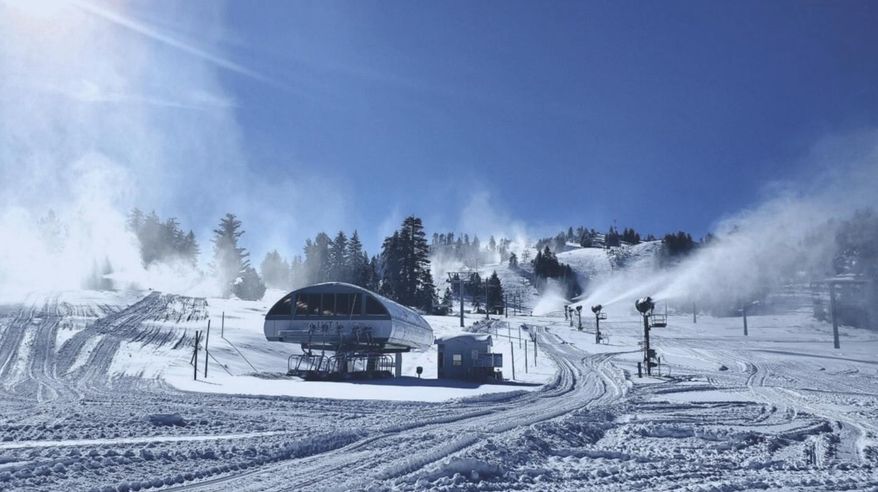 This photo provided by Snow Valley Mountain Resort shows slopes covered with natural and man-made snow at the ski area at Running Springs in the San Gabriel Mountains of Southern California Monday, Dec. 28, 2020. Rain, hail, and snow fell Monday as Southern California saw its first significant storm of the season. Lightning flashed and thunder sounded as the storm front swept across the region in the middle of the night, unleashing downpours followed by bands of rain that were expected to continue through the afternoon. (Snow Valley Mountain Resort via AP)