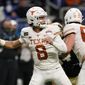 Texas quarterback Casey Thompson (8) looks for a receiver during the second half of the team&#39;s Alamo Bowl NCAA college football game against Colorado, Tuesday, Dec. 29, 2020, in San Antonio. (AP Photo/Eric Gay)