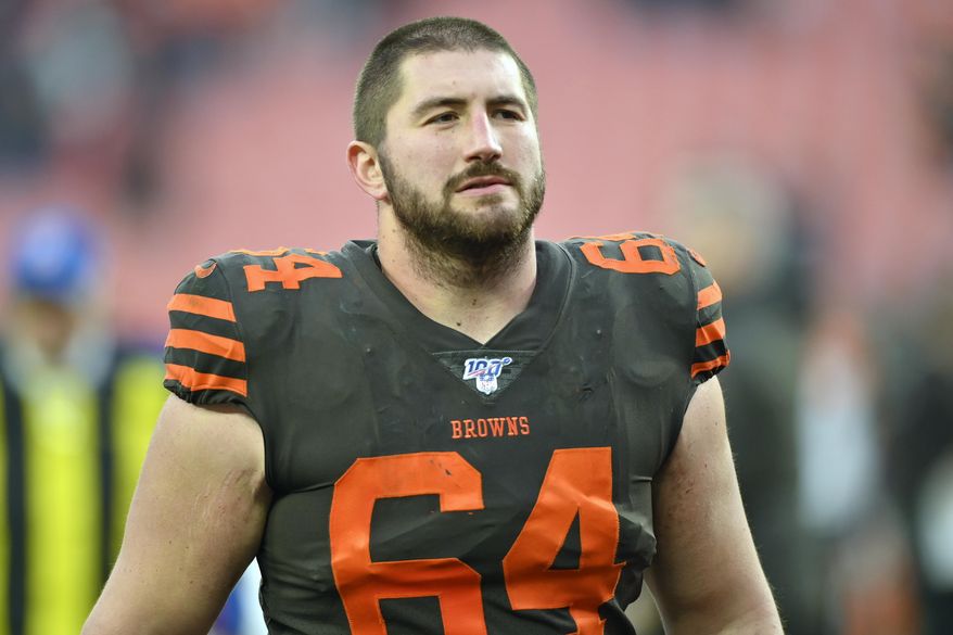 FILE - In this Dec. 8, 2019, file photo, Cleveland Browns center and NFLPA president JC Tretter walks off the field after an NFL football game against the Cincinnati Bengals in Cleveland. Playing through the COVID-19 pandemic has yielded countless lessons for a league that was born in the shadows of the 1918 Spanish Flu pandemic.Commissioner Roger Goodell said the league will confer with the players union after the Super Bowl to discuss what measures might make sense keeping once the crisis subsides.(AP Photo/David Richard, File)