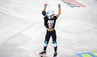  Sky Brown, 11, celebrates after maxing out her time on her first run during the women&#39;s skateboard park qualifier round at the X Games in Minneapolis, in this Friday, Aug, 2, 2019, file photo. It’s understandable if names such as skateboarder Sky Brown, Denver Nuggets center Bol Bol or French Open champion Iga Swiatek don’t ring an instant bell. Just wait, though. By the time 2021 ends, they could be making an even bigger name for themselves. (Nicole Neri/Star Tribune via AP, File) **FILE**