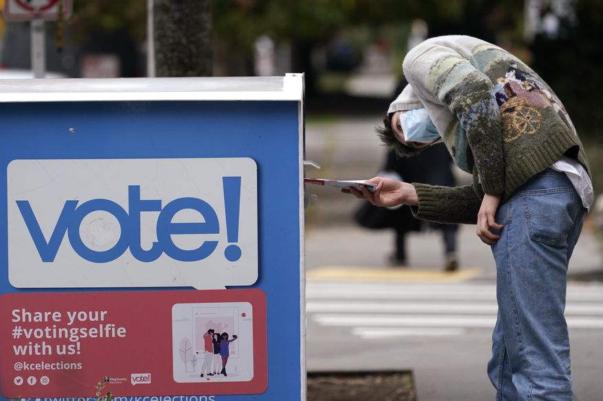 A new poll finds 1 in 10 American adults say they will never accept Joseph R. Biden as president. One third say he won due to voter fraud. (AP Photo/Elaine Thompson, File)