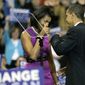 FILE - This June 3, 2008, file photo shows then Democratic presidential candidate Sen. Barack Obama fist bump with his wife Michelle, before speaking at a primary night rally in St. Paul, Minn. Barack and Michelle Obama famously fist-bumped when he clinched the Democratic presidential nomination in June 2008, making the move very cool in some circles, causing outrage in others. (AP Photo/Morry Gash, File)