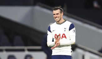 Tottenham&#39;s Gareth Bale grimaces as he reacts after a chance on gaol during the English Premier League soccer match between Tottenham Hotspur and Leicester City at the White Hart Lane stadium in London, Sunday, Dec., 20 2020. (Julian Finney/ Pool via AP)