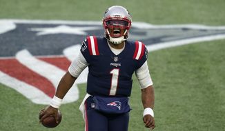 New England Patriots quarterback Cam Newton celebrates his touchdown pass to Devin Asiasi in the second half of an NFL football game against the New York Jets, Sunday, Jan. 3, 2021, in Foxborough, Mass. (AP Photo/Elise Amendola)