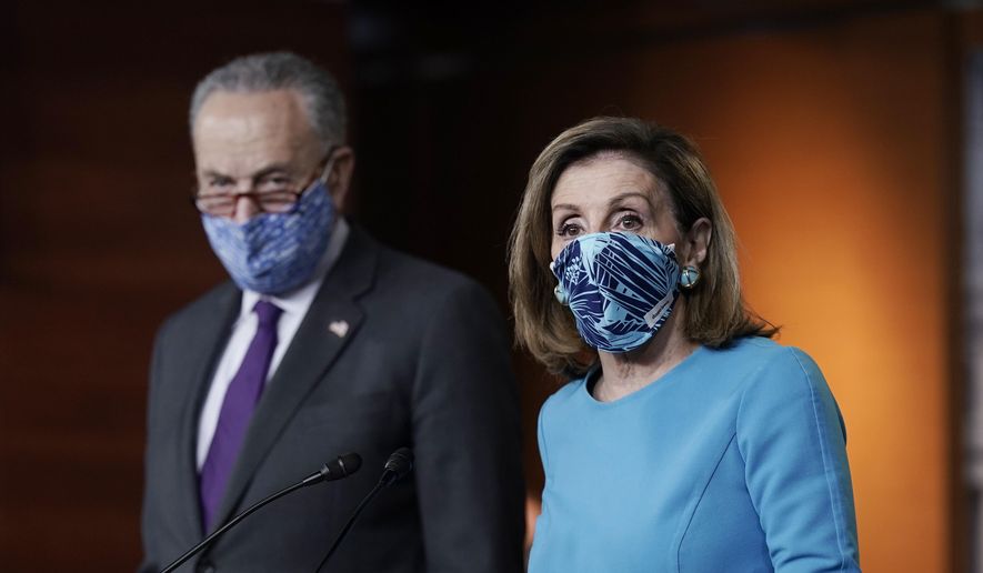 In this Thursday, Nov. 12, 2020, file photo, Speaker of the House Nancy Pelosi, D-Calif., and then-Senate Minority Leader Chuck Schumer, D-N.Y., meet with reporters on Capitol Hill in Washington. (AP Photo/J. Scott Applewhite, File) ** FILE **