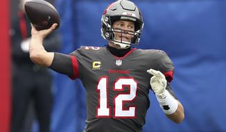 Tampa Bay Buccaneers quarterback Tom Brady (12) throws a pass against the Atlanta Falcons during the first half of an NFL football game Sunday, Jan. 3, 2021, in Tampa, Fla. (AP Photo/Mark LoMoglio)