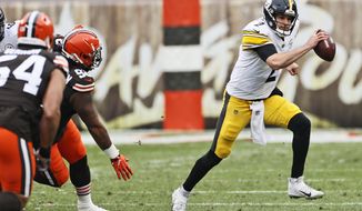 Pittsburgh Steelers quarterback Mason Rudolph (2) scrambles during the first half of an NFL football game against the Cleveland Browns, Sunday, Jan. 3, 2021, in Cleveland. (AP Photo/Ron Schwane)