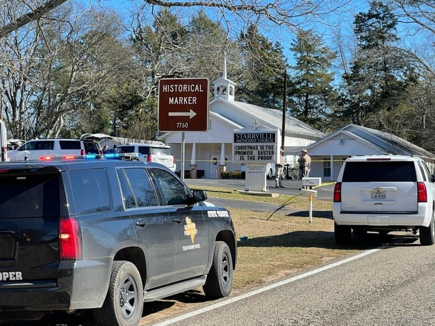 The Smith County Sheriff's Office investigates a fatal shooting incident at the Starville Methodist Church in Winona, Texas, on Sunday morning, Jan. 3, 2021. A suspect who fled has been arrested, said the sheriff’s office. (Zak Wellerman/Tyler Morning Telegraph via AP)