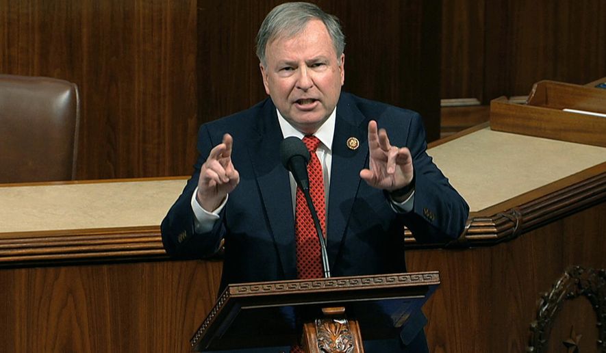 In this Dec. 18, 2019, file photo, Rep. Doug Lamborn, R-Colo., speaks at the Capitol in Washington. Lamborn on Monday, Jan. 4, 2021, joined the state&#x27;s newest member of Congress, Republican Lauren Boebert, in saying he will vote against certifying Democrat Joe Biden&#x27;s presidential election victory in a joint session of Congress on Wednesday, Jan. 6. (House Television via AP, File)