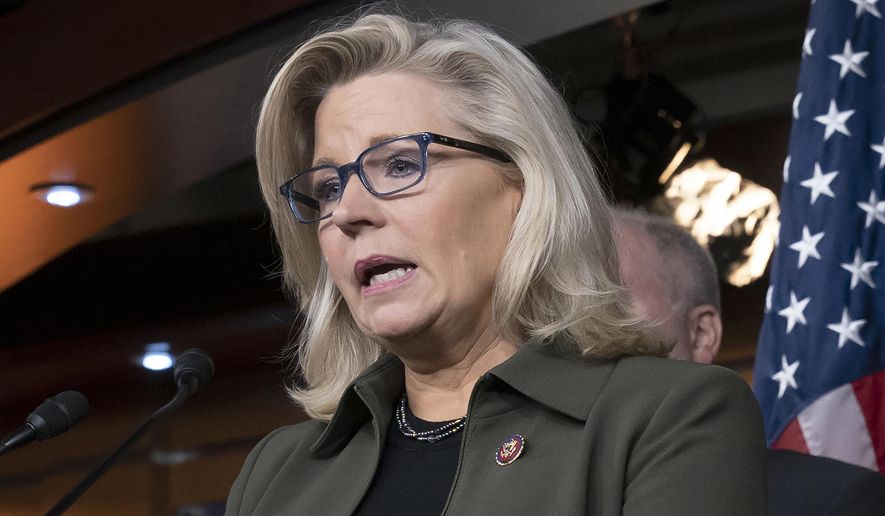 In this Dec. 17, 2019 file photo, Rep. Liz Cheney, R-Wyo., speaks with reporters at the Capitol in Washington. A deepening divide among Republicans over President Donald Trump&#39;s efforts to overturn the election runs prominently through Wyoming, the state that delivered Trump&#39;s widest prevailing margin by far. Eleven Republican senators saying they will not be voting Wednesday, Jan. 6, 2021, to confirm President-elect Joe Biden&#39;s victory include Wyoming&#39;s newly sworn in Sen. Cynthia Lummis, a Cheyenne-area rancher and former congresswoman. Vocal opponents of any such move include Wyoming Rep. Liz Cheney, leader of GOP messaging in the House as its third-ranking Republican (AP Photo/J. Scott Applewhite, File)